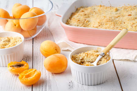 Homemade mix apricot crumble. Healthy breakfast conceptの写真素材