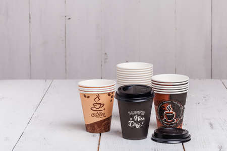 coffee bean with paper cup on wood backgroundの写真素材