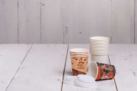 coffee cups on wooden table for site headerの写真素材
