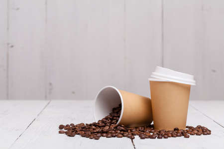 coffee cups on wooden table for site headerの写真素材