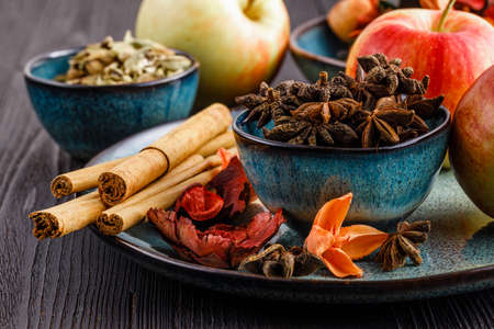 Cinnamon and star anise on blue bowlの写真素材