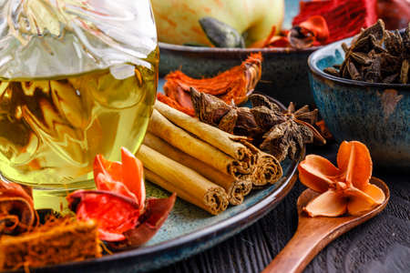 Cinnamon and star anise on blue bowlの写真素材