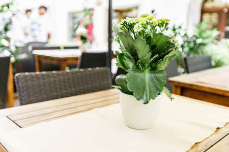 Selective focus of table of coffee shop outside view in Autriaの写真素材