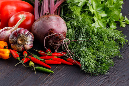 Variety of fresh organic vegetables on kitchen tableの写真素材