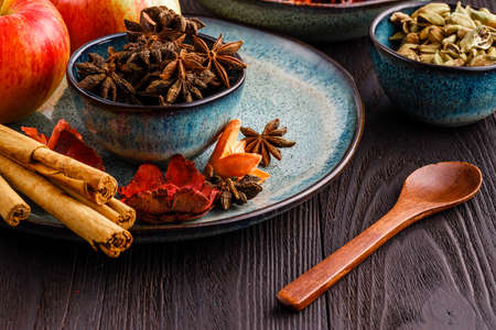 Cinnamon and star anise on blue bowlの写真素材