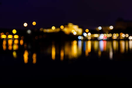 Defocus boken colorful nightlife on riverの写真素材