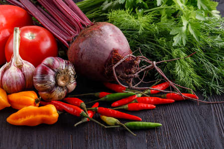 variety of fresh organic vegetables on kitchen tableの写真素材
