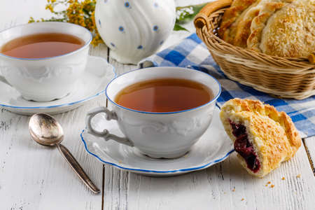 cup of tea in a beautiful cup for breakfast at homeの写真素材