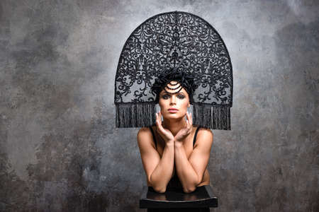 Beautiful woman in Russian kokoshnik hat. Retro fashionの写真素材