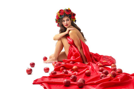 Spring Woman. Beauty Summer model girl with colorful flowers wreath and colorful hair.の写真素材