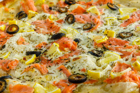 Close up view of detail fresh and very tasty pizzaの写真素材
