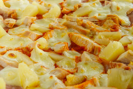 Pizza background. Pizza with sausage and other ingredients close up close up.の写真素材