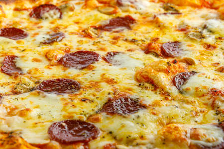 Close up view of detail fresh and very tasty pizzaの写真素材