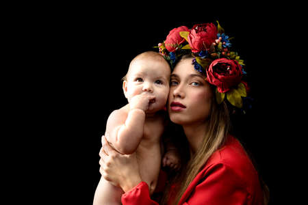 Mother with baby, motherhood concept. in the image of the madonnaの写真素材