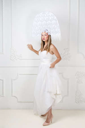 Amazed woman at russian traditional cap hat kokoshnikの写真素材