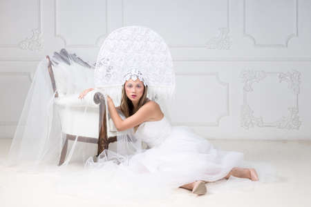 Amazed woman at russian traditional cap hat kokoshnikの写真素材