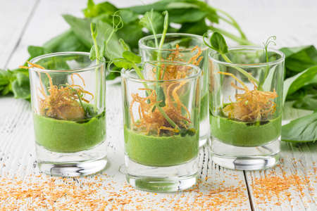 Catering, banquet or party food concept. Dessert in glass with blackberries and mint leaves on corporate event, christmas, birthday, wedding celebration, selective focusの写真素材