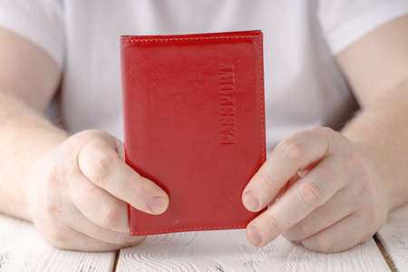 man hand holding passport idの写真素材