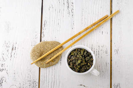 Green tea in a white cup.の写真素材