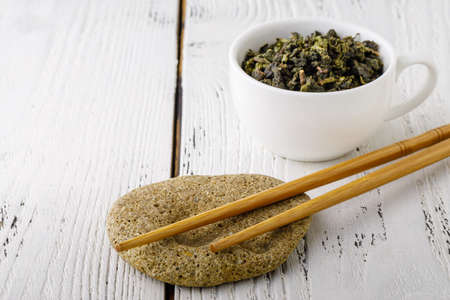 Green tea in a white cup.の写真素材