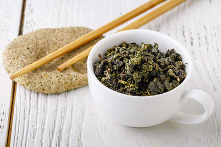 Traditional green Chinese tea. Tea on a white background. Tiguanin