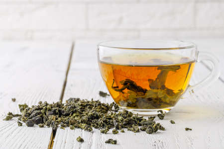 Green tea in a white cup.の写真素材