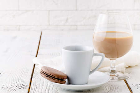 coffee in white ceramic cup and chocoの写真素材