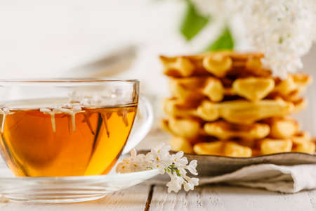Fresh homemade belgian waffers for breakfastの写真素材