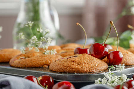 homemade vegan muffins with fresh cherries
