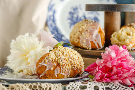 breakfast pastries served with flowers, retro styleの写真素材