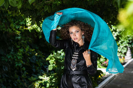 Beautiful modern girl near the brickwall. Youth style. Fashion shot.の写真素材