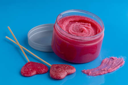 Sugar body scrub on blue backgroundの写真素材