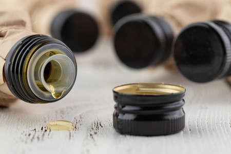 Close up olive oil bottle on tableの写真素材