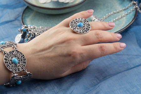 Girl wearing many antique handcrafted Turkish jewelryの写真素材