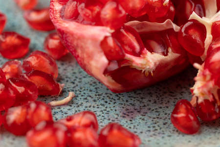 Beautiful red pomegranate fruit composition on a plate background. Azerbaijanの写真素材
