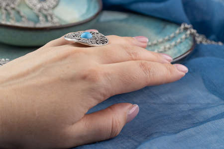 Girl wearing many antique handcrafted Turkish jewelryの写真素材