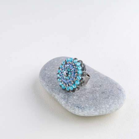 Jewelry fashion. Earrings presented on a stone in the background.の写真素材