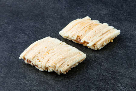 Frozen Chicken Cutlet on Stone Background. Frozen Semi-finished Productsの写真素材