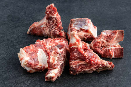 Raw meat with beef bone. Beef bone selection for soupの写真素材