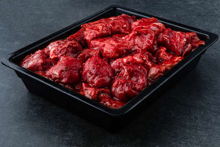 Raw pieces of meat shish kebab in marinade with pepper, onion, ready to cook, barbecue meatの写真素材