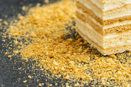 Close up view of delicious Napoleon cake on stone tableの写真素材