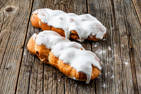 Sweet Soft puff pastry bun with custard, raisins and chocolate Bakery