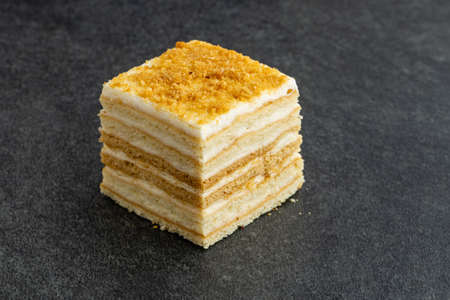 Close up view of delicious Napoleon cake on stone tableの写真素材