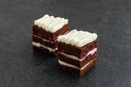 Homemade bakery dark chocolate brownies cake. Delicious bitter sweet and chewy. Brownie is one type of chocolate cake.の写真素材