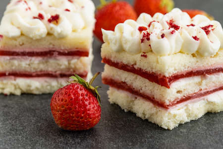 Close up view of piece of strawberry cheescakeの写真素材