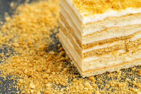 Close up view of delicious Napoleon cake on stone tableの写真素材