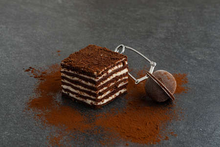 chocolate vanilla cake on gray stone