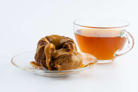 breakfast with chocolate brownie, caramel and tea cupの写真素材