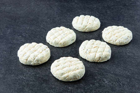 Frozen meat dumplings on gray stone backgroundの写真素材