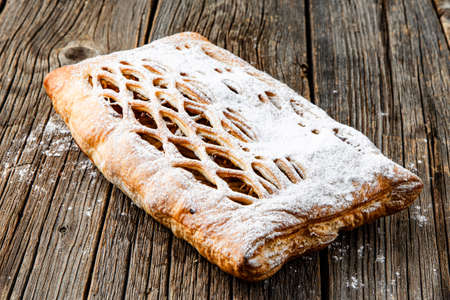 Sweet Soft puff pastry bun with custard, raisins and chocolate Bakeryの写真素材